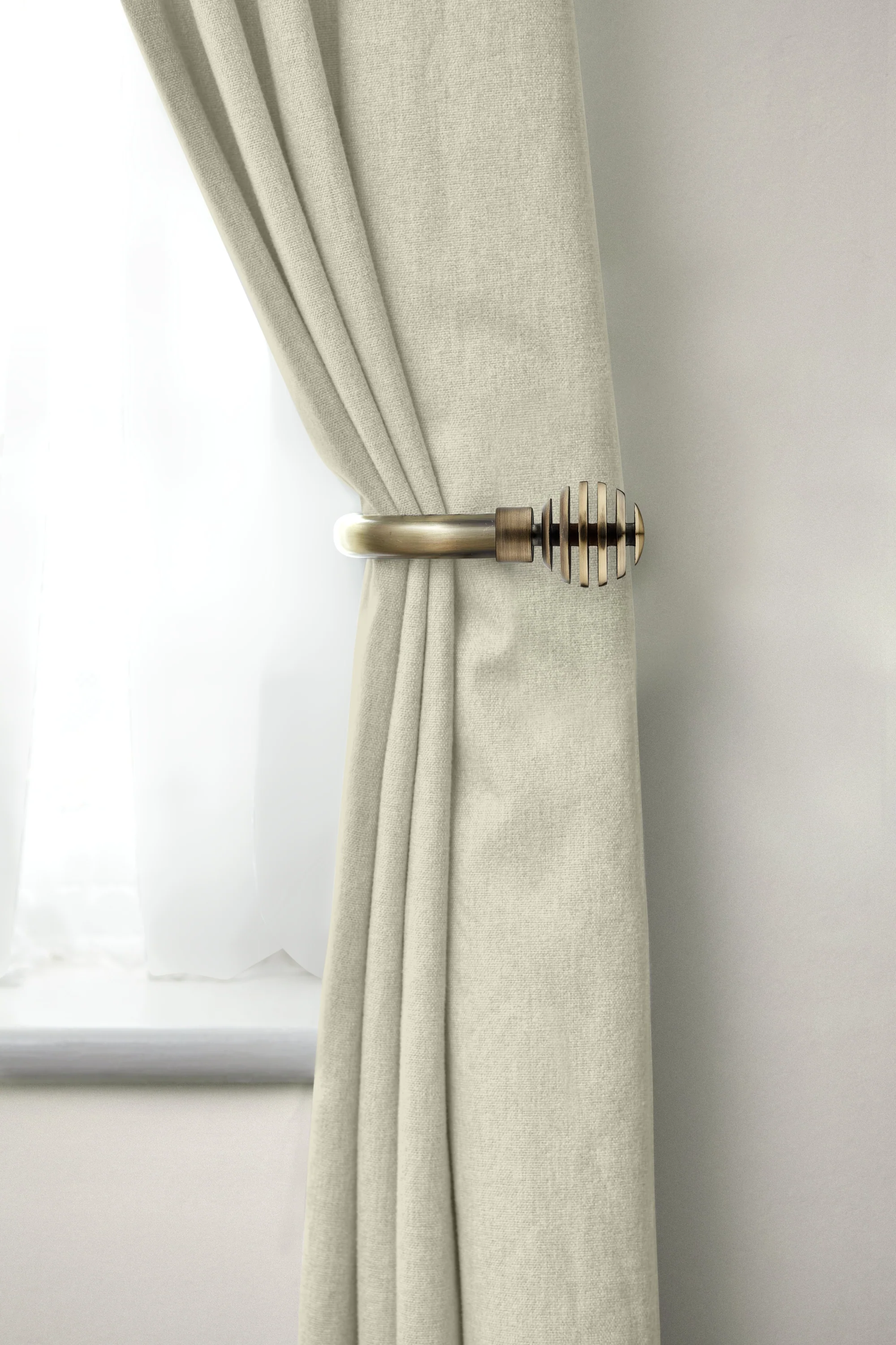 Metal Sliced - Pair of Holdaback Tiebacks with End Finials in Antique Brass